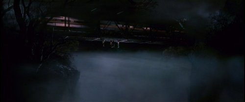 The Lost Boys hang from the bridge as a train passes over see the similarity? The Lost Boys (1987)