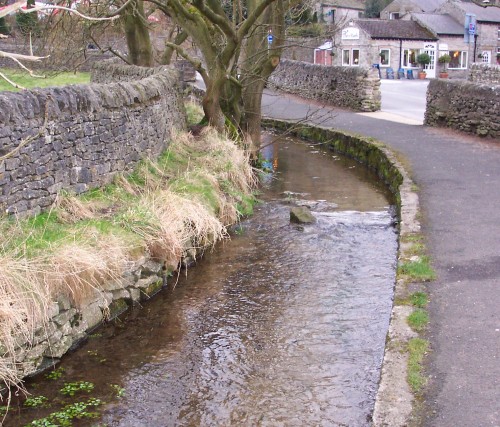 A clean and pretty stream flows through a nice village, Peak District (2006)