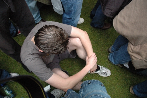 My brother takes a break from standing up. Poor boy. Manchester (2008)