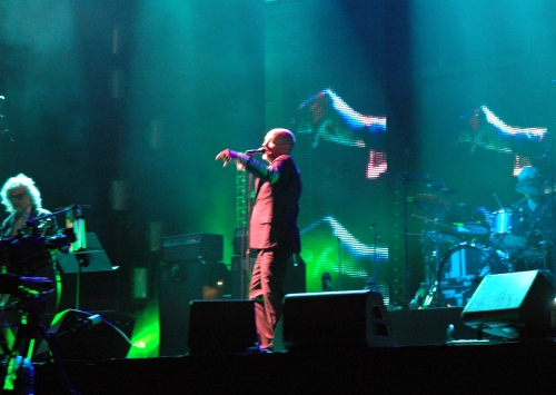 Michael Stipe does some shadow puppetry I think it's suppose to be a rabbit. Manchester (2008)