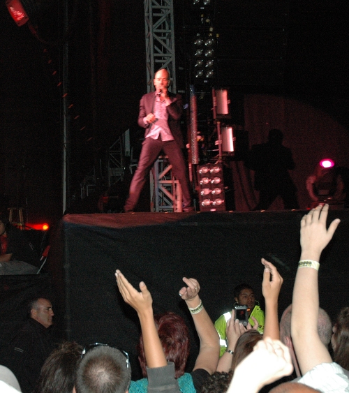 Michael Stipe contemplates a bit of crowd surfing go on Michael, jump! Manchester (2008)