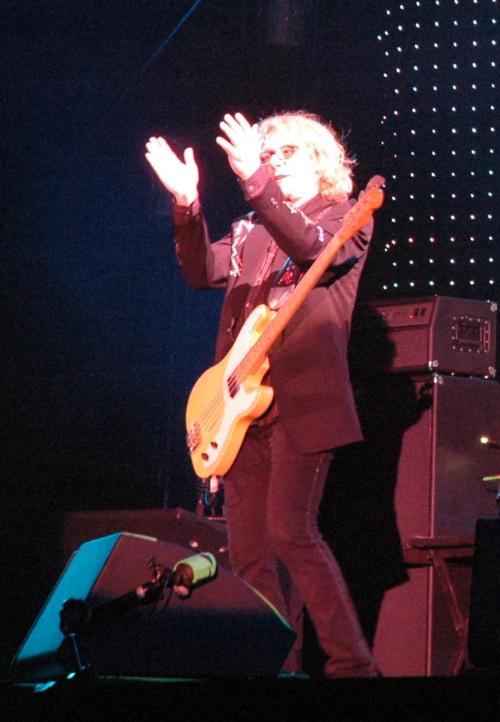 Mike Mills starts moving invisible objects around the stage. Manchester (2008)