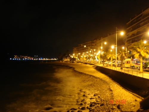 The beach and restaurants on the sea front of Altea at night, Spain (2006)