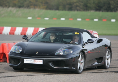 Driving a Ferrari Spyder 350 under the instruction of some geezer I didn't really pay attention too, Bruntingthorpe proving ground (2006)