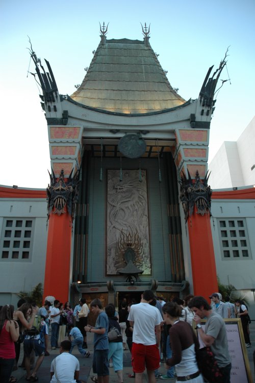 The front of Mann's Chinese Theatre. Lots of people looking at the prints left by celebrities. Los Angeles (2007)